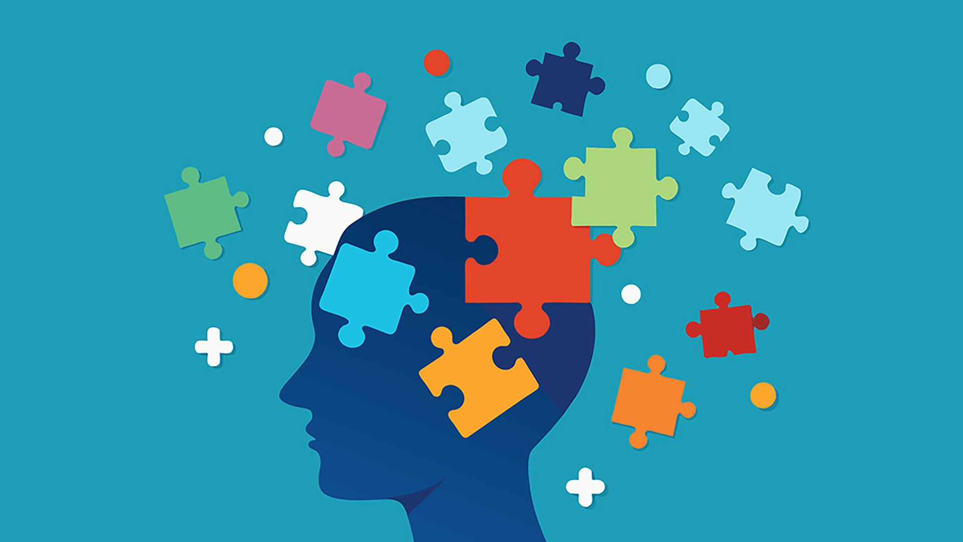 Abbildung eines Kopfes mit bunten Puzzleteilen